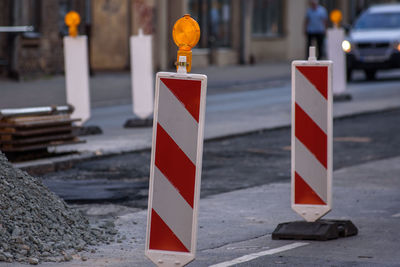 Road signs on street in city