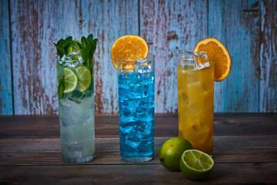 Glass of fruits on table