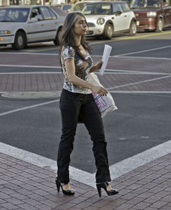 Woman walking on street