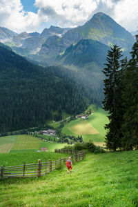 Scenic view of landscape and mountains against sky