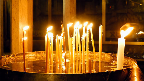 Close-up of illuminated candles
