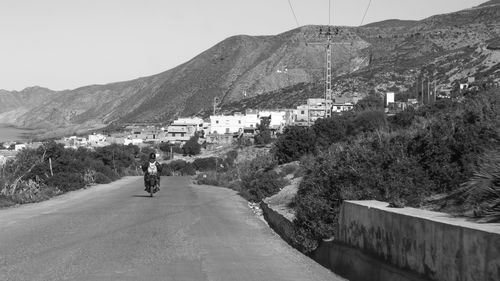 Road leading towards mountains