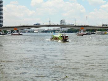 Boats sailing in river