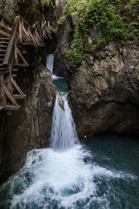 Scenic view of waterfall in forest