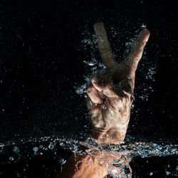 Digital composite image of person swimming in sea