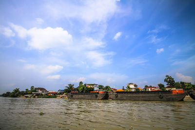 Scenic view of river against sky