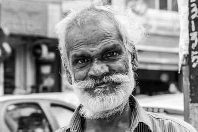 Close-up portrait of senior man