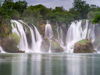 View of waterfall in forest