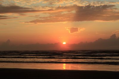 Scenic view of sunset over sea