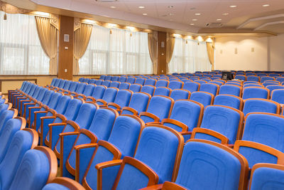 Empty chairs in stadium