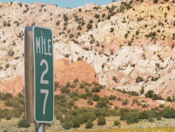 Road sign on landscape