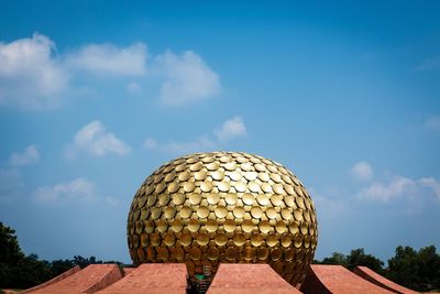 High section of hot air balloon against blue sky