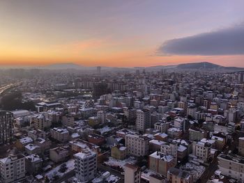 High angle view of townscape against sky during sunset