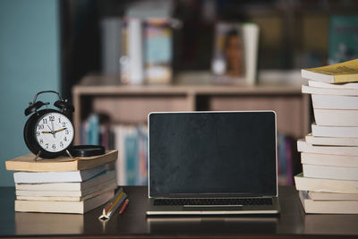 Stack of books on table
