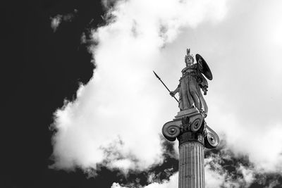 Low angle view of statue against sky