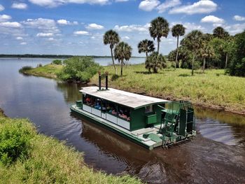Scenic view of lake against cloudy sky