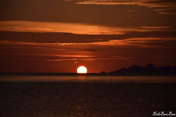 SCENIC VIEW OF SEA DURING SUNSET