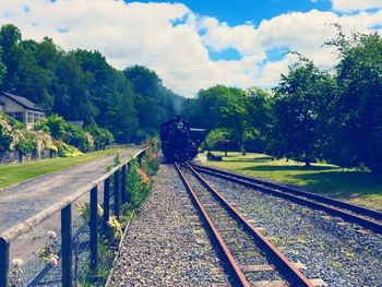 Railroad track against sky