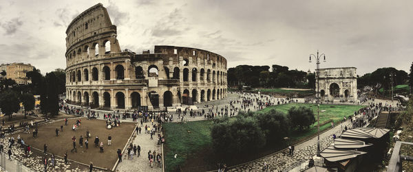 Group of people in front of historical building