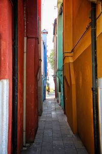 Alley amidst buildings in city