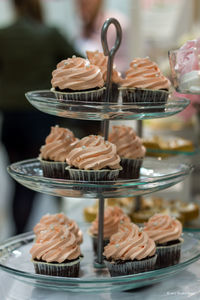 Close-up of cupcakes on table for sale