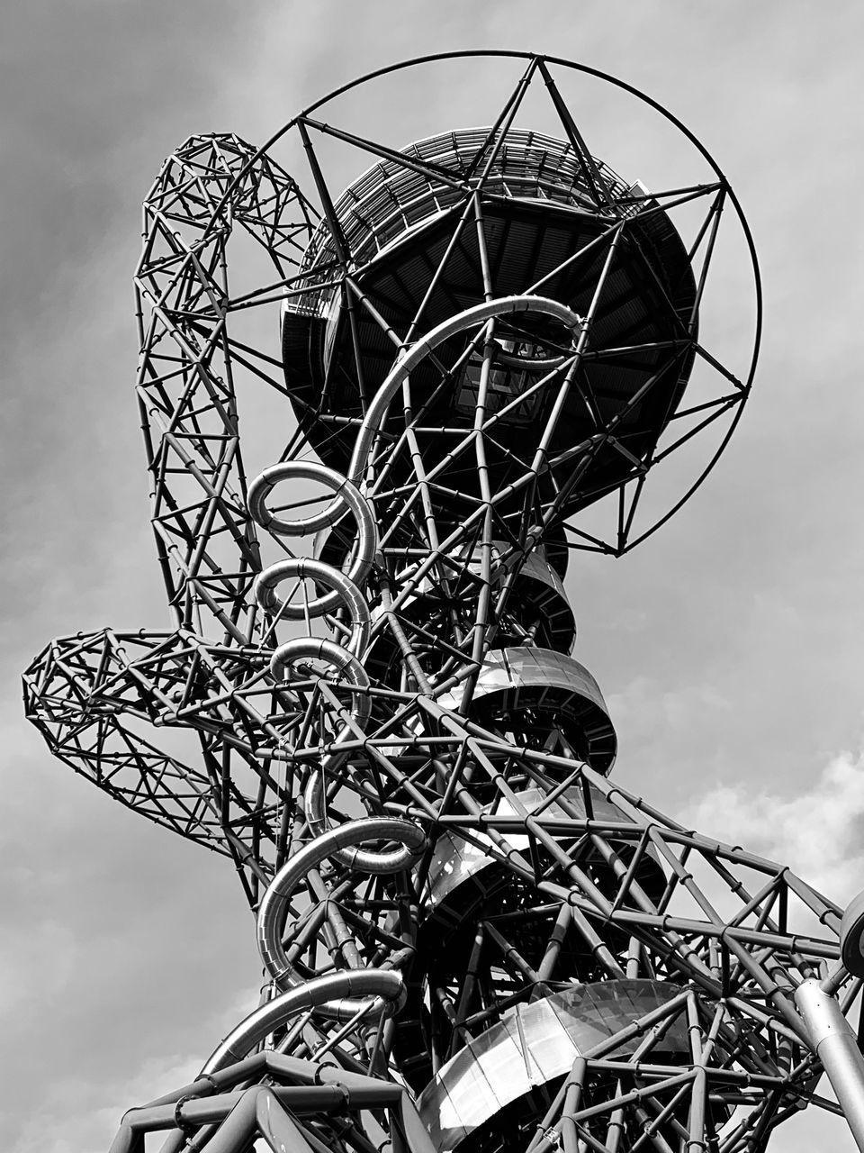 LOW ANGLE VIEW OF ROLLERCOASTER AGAINST SKY