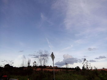 Scenic view of landscape against cloudy sky