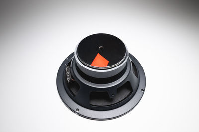 High angle view of camera against white background