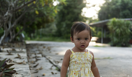 Cute little girl going out in the field