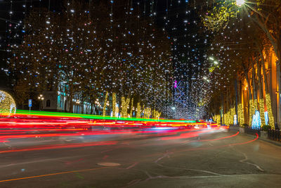 Light trails on city street at night