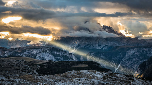 Scenic view of mountains against sky during sunset