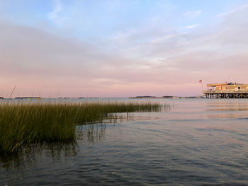 Scenic view of sea against sky during sunset