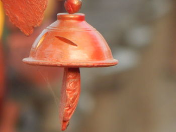 Close-up of red bell hanging