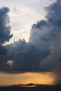 Low angle view of dramatic sky during sunset