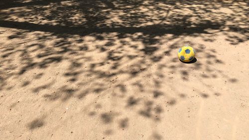 High angle view of ball on sand