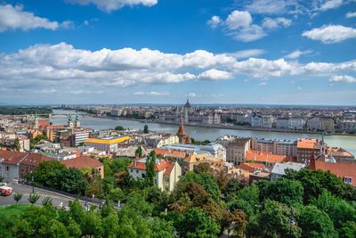 Panoramic view of the danube river and the embankment of budapest, hungary, on a summer morning