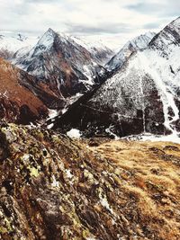 Scenic view of snowcapped mountains against sky