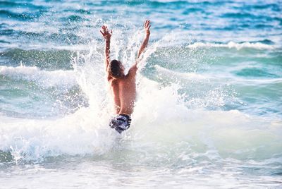 Man surfing in sea