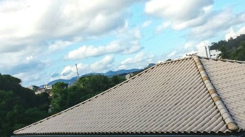 Roof of house against sky