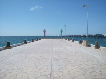 Scenic view of sea against blue sky