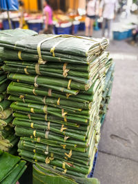 Close-up of stack of wood at market stall