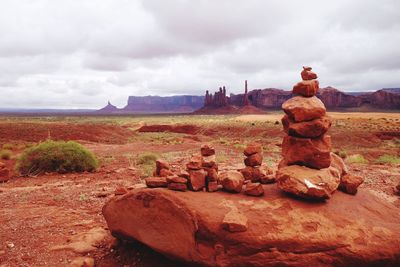 Stack of pebbles on barren landscape