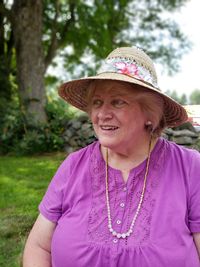 Portrait of woman with pink hat