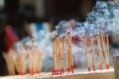 Close-up of burning incense