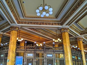 Low angle view of illuminated ceiling of building