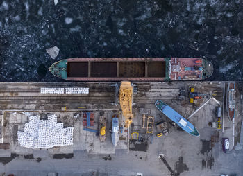 Aerial view from above of the river port with gantry cranes. cranes in the cargo port of togliatti.