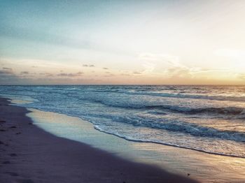 Scenic view of sea against sky during sunset