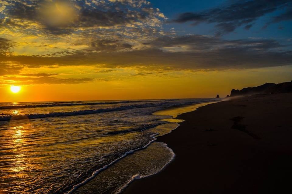 sunset, sea, water, scenics, horizon over water, beauty in nature, tranquil scene, beach, tranquility, sky, orange color, shore, sun, idyllic, nature, cloud - sky, wave, sunlight, coastline, reflection