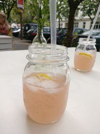 Close-up of drink in jar on table
