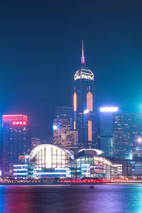 Illuminated buildings in city at night